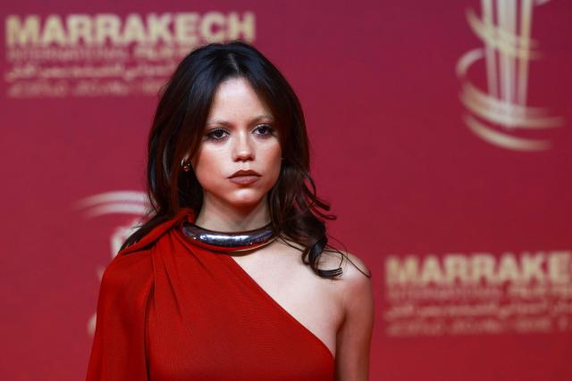 US actress Jenna Ortega poses on the red carpet as she arrives for the closing ceremony of the 22nd Marrakesh Film Festival (FIFM) in Marrakesh on December 6, 2025. (Photo by Abdel Majid BZIOUAT / AFP)