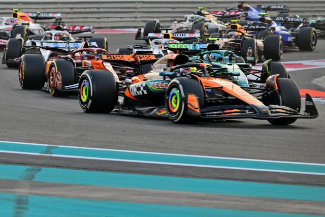 Drivers compete during the Abu Dhabi Formula One Grand Prix at the Yas Marina Circuit in Abu Dhabi on December 7, 2025. (Photo by Andrej ISAKOVIC / AFP)