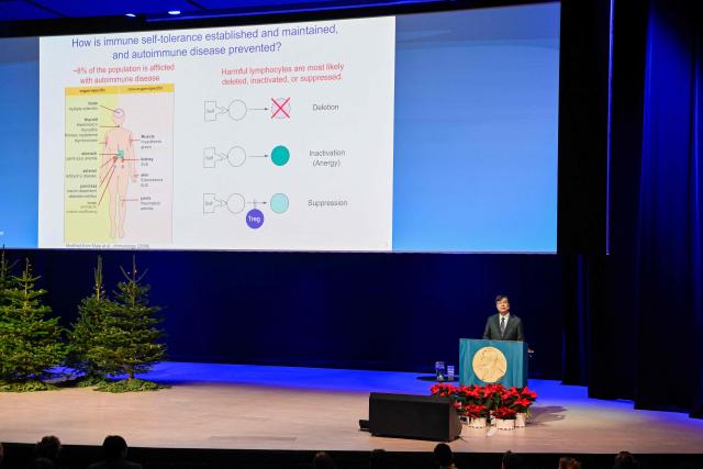 Nobel Prize in Physiology or Medicine 2025 laureate Japanese immunologist Shimon Sakaguchi delivers a speech at the Aula Medica in Stockholm, Sweden, on December 7, 2025.  (Photo by Henrik MONTGOMERY / TT News Agency / AFP) / Sweden OUT