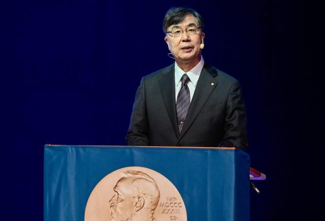 Nobel Prize in Physiology or Medicine 2025 laureate Japanese immunologist Shimon Sakaguchi delivers a speech at the Aula Medica in Stockholm, Sweden, on December 7, 2025.  (Photo by Henrik MONTGOMERY / TT News Agency / AFP) / Sweden OUT