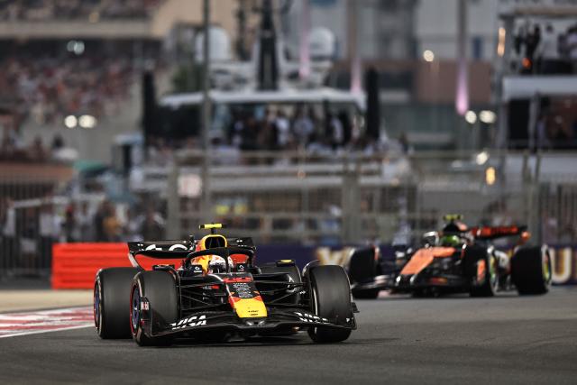 Red Bull Racing's Japanese driver Yuki Tsunoda competes during the Abu Dhabi Formula One Grand Prix at the Yas Marina Circuit in Abu Dhabi on December 7, 2025. (Photo by Fadel SENNA / AFP)