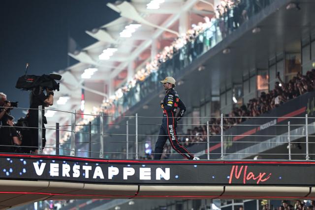Race winner Red Bull Racing's Dutch driver Max Verstappen celebrates at the end of the Abu Dhabi Formula One Grand Prix at the Yas Marina Circuit in Abu Dhabi on December 7, 2025. (Photo by Fadel SENNA / AFP)