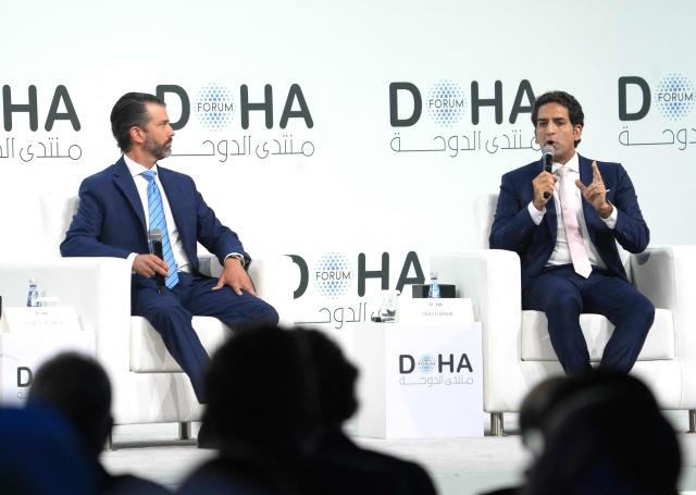 Picture of Donald Trump Jr., on the left, and Omeer Malik, on the right, talking to the audience at Doha Forum in Qatar on December 07, 2025. (Photo by HUSSEIN BAYDOUN / MOFA / FACTSTORY) / Disclaimer: This document is neither produced nor endorsed by AFP. It is distributed under its issuer sole responsibility. Its reproduction is authorized in context without any distortion of content. If you have any question about this document, please contact its issuer.