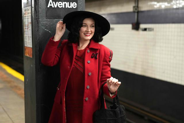 People attend the annual Holiday Nostalgia Rides in the New York City subway system in New York, on December 7, 2025. Every Holiday season, the New York Transit Museum and the NYC Transit Authority offer rides in restored vintage subway cars for a chance to step back in time. The Holiday Nostalgia Rides feature eight cars from the 1930s that served on lettered lines through the late 1970s. (Photo by TIMOTHY A. CLARY / AFP)