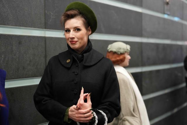 People attend the annual Holiday Nostalgia Rides in the New York City subway system in New York, on December 7, 2025. Every Holiday season, the New York Transit Museum and the NYC Transit Authority offer rides in restored vintage subway cars for a chance to step back in time. The Holiday Nostalgia Rides feature eight cars from the 1930s that served on lettered lines through the late 1970s. (Photo by TIMOTHY A. CLARY / AFP)