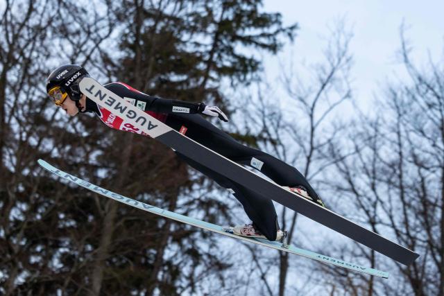 France's Valentin Foubert soars through the air during the Men's Large Hill HS134 competition of the FIS Ski Jumping World Cup in Wisla, Poland on December 7, 2025. (Photo by Wojtek RADWANSKI / AFP)