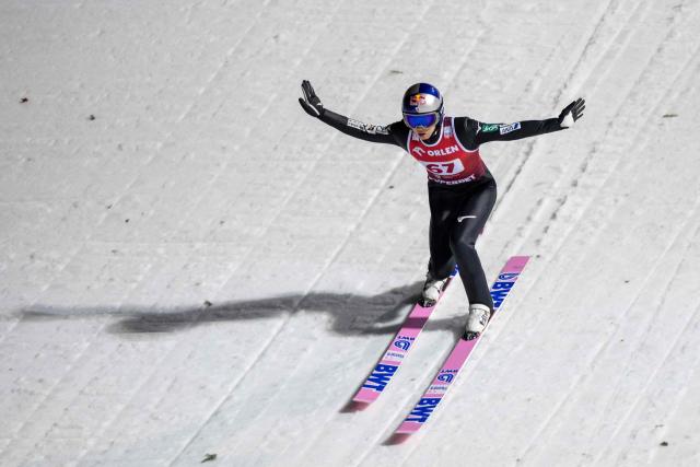Japan's Ryoyu Kobayashi lands after the jump during the Men's Large Hill HS134 competition of the FIS Ski Jumping World Cup in Wisla, Poland on December 7, 2025. (Photo by Wojtek RADWANSKI / AFP)