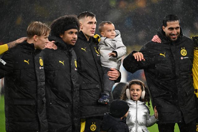 (RtoL) Dortmund's German midfielder #23 Emre Can, Dortmund's German defender #04 Nico Schlotterbeck and Dortmund's German forward #27 Karim Adeyemi react after the end of the German first division Bundesliga football match between BVB Borussia Dortmund and TSG 1899 Hoffenheim in Dortmund, western Germany, on December 7, 2025. (Photo by UWE KRAFT / AFP) / DFL REGULATIONS PROHIBIT ANY USE OF PHOTOGRAPHS AS IMAGE SEQUENCES AND/OR QUASI-VIDEO