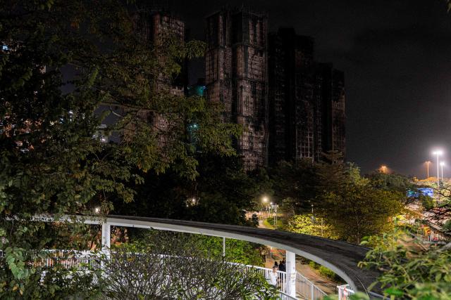 A view of the Wang Fuk Court residential estate in Tai Po district of Hong Kong on December 7, 2025. (Photo by Leung Man Hei / AFP)