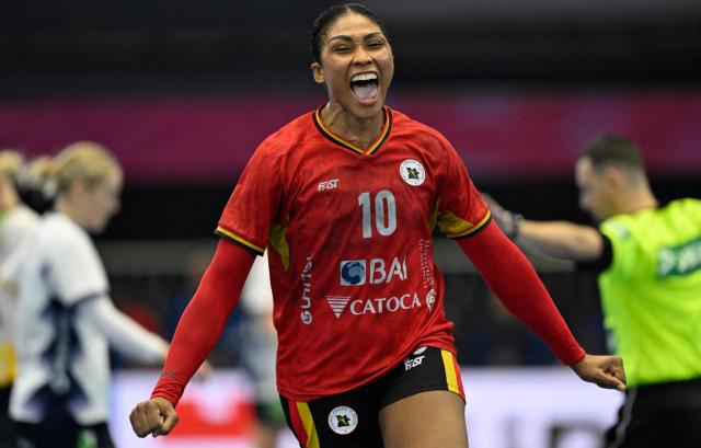 Angola's pivot #10 Albertina Kassoma celebrates during the Group IV main round match between Angola and Sweden of the IHF Women's Handball World Championship in Dortmund, western Germany on December 7, 2025. (Photo by Ina FASSBENDER / AFP)