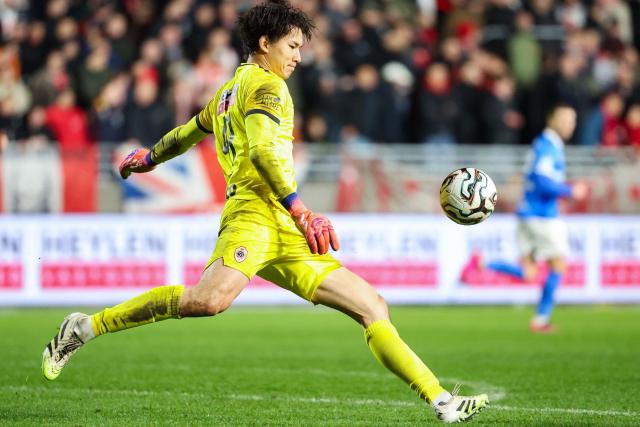 Antwerp's Japanese goalkeeper Taishi Brandon Nozawa shoots the ball during the Belgian "Pro League" First Division football match between Royal Antwerp FC and KRC Genk in Antwerp on December 7, 2025. (Photo by VIRGINIE LEFOUR / Belga / AFP) / Belgium OUT