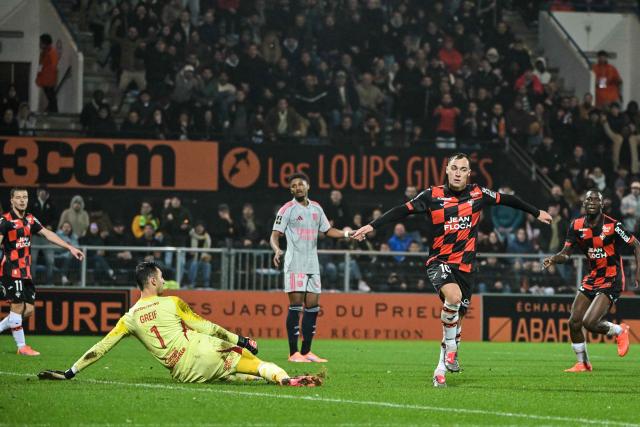 Lorient's French forward #10 Pablo Pagis (2nd R) celebrates after scoring his team first goal during the French L1 football match between FC Lorient and Olympique Lyonnais (OL) at the Stade du Moustoir stadium in Lorient, western France, on December 7, 2025. (Photo by Damien Meyer / AFP)