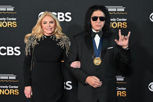 Kennedy Center honoree Gene Simmons, a member of the US rock band KISS, and his wife Shannon Tweed arrive for the 48th Kennedy Center Honors gala at the Kennedy Center in Washington, DC, on December 7, 2025. (Photo by Alex WROBLEWSKI / AFP)