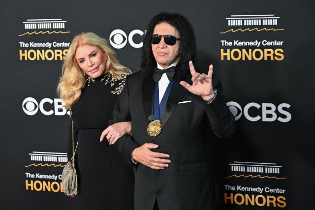 Kennedy Center honoree Gene Simmons, a member of the US rock band KISS, and his wife Shannon Tweed arrive for the 48th Kennedy Center Honors gala at the Kennedy Center in Washington, DC, on December 7, 2025. (Photo by Alex WROBLEWSKI / AFP)