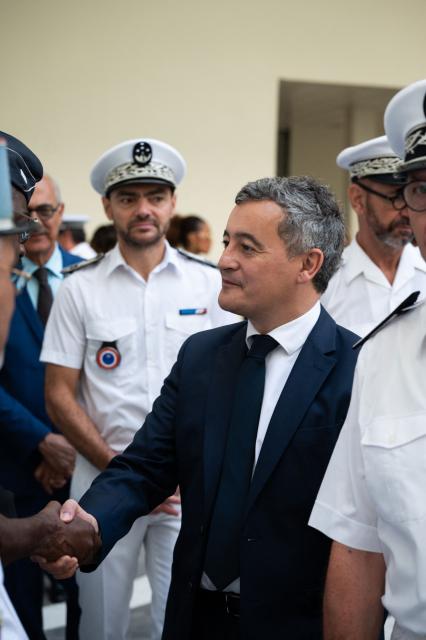 France's Minister of Justice Gerald Darmanin (C) visits the new detention center of Basse-Terre in the French archipelago of Guadeloupe, on December 7, 2025. The French Minister of Justice inaugurated on December 7, 2025 in Basse-Terre, the prefecture of the Guadeloupe archipelago, the new detention center that had been under construction for several years. (Photo by Carla Bernhardt / AFP)