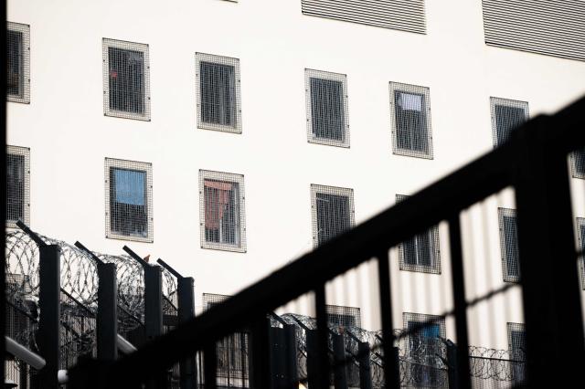 This photograph shows an outside view of cell windows on a facade of the newly inaugurated detention center of Basse-Terre in the French archipelago of Guadeloupe, on December 7, 2025. The French Minister of Justice inaugurated on December 7, 2025 in Basse-Terre, the prefecture of the Guadeloupe archipelago, the new detention center that had been under construction for several years. (Photo by Carla Bernhardt / AFP)