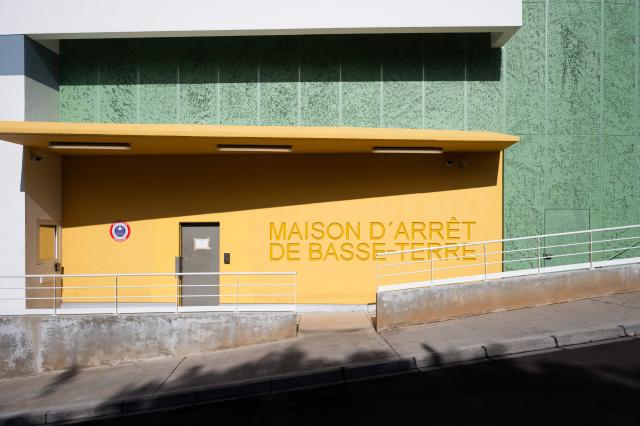 This photograph shows an outside view of the newly inaugurated detention center of Basse-Terre in the French archipelago of Guadeloupe, on December 7, 2025. The French Minister of Justice inaugurated on December 7, 2025 in Basse-Terre, the prefecture of the Guadeloupe archipelago, the new detention center that had been under construction for several years. (Photo by Carla Bernhardt / AFP)