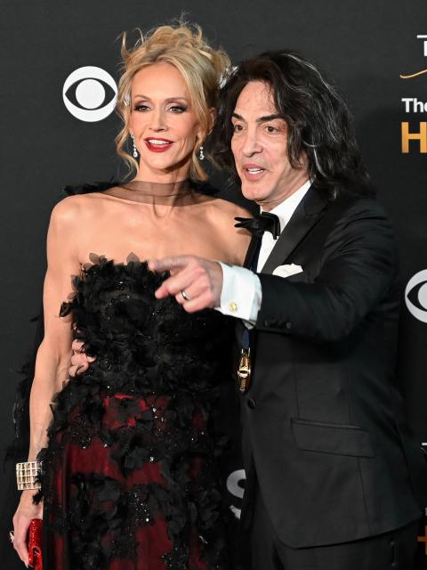 Kennedy Center honoree Paul Stanley, a member of the US rock band KISS, and his wife Erin Sutton arrive for the 48th Kennedy Center Honors gala at the Kennedy Center in Washington, DC, on December 7, 2025. (Photo by Alex WROBLEWSKI / AFP)