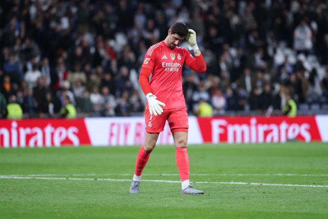 Real Madrid's Belgian goalkeeper #01 Thibaut Courtois gestures during the Spanish league football match between Real Madrid CF and RC Celta de Vigo at the Santiago Bernabeu Stadium in Madrid on December 7, 2025. (Photo by Thomas COEX / AFP)