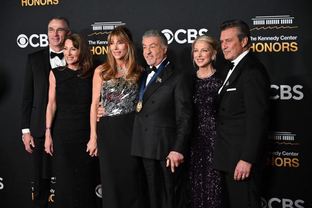 US actor and Kennedy Center Honoree Sylvester Stallone (C) and family arrive for the 48th Kennedy Center Honors gala at the Kennedy Center in Washington, DC, on December 7, 2025. (Photo by Alex WROBLEWSKI / AFP)