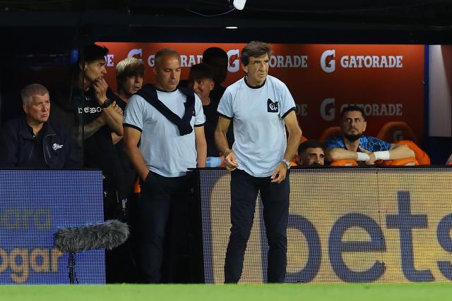 Racing's head coach Gustavo Costas looks on during the Argentine Professional Football League 2025 Clausura Tournament match between Boca Juniors and River Plate at the La Bombonera Stadium in Buenos Aires on November 9, 2025. (Photo by ALEJANDRO PAGNI / AFP)