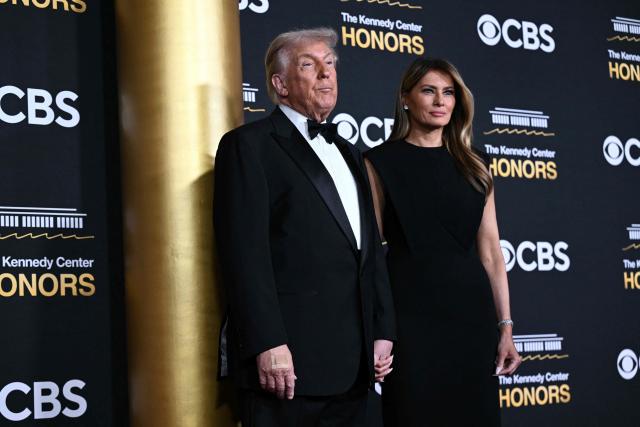 US President Donald Trump and First Lady Melania Trump arrive for the 48th Kennedy Center Honors gala at the Kennedy Center in Washington, DC, on December 7, 2025. (Photo by Brendan SMIALOWSKI / AFP)