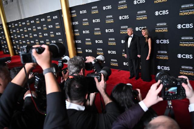 US President Donald Trump and First Lady Melania Trump arrive for the 48th Kennedy Center Honors gala at the Kennedy Center in Washington, DC, on December 7, 2025. (Photo by Brendan SMIALOWSKI / AFP)