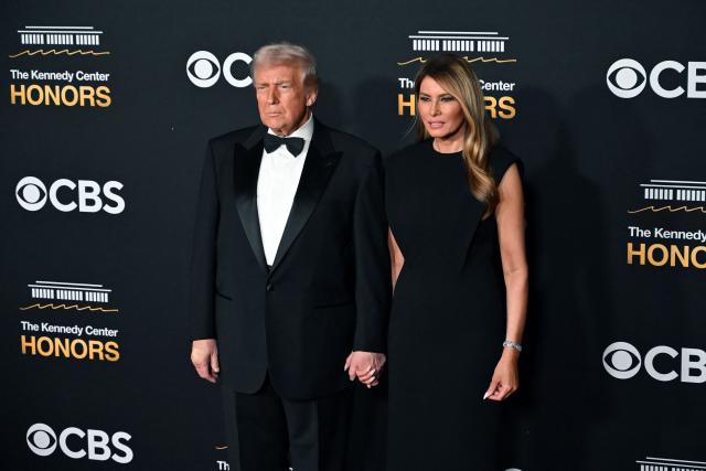 US President Donald Trump and First Lady Melania Trump arrive for the 48th Kennedy Center Honors gala at the Kennedy Center in Washington, DC, on December 7, 2025. (Photo by Brendan SMIALOWSKI / AFP)