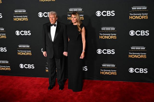 US President Donald Trump and First Lady Melania Trump arrive for the 48th Kennedy Center Honors gala at the Kennedy Center in Washington, DC, on December 7, 2025. (Photo by Brendan SMIALOWSKI / AFP)