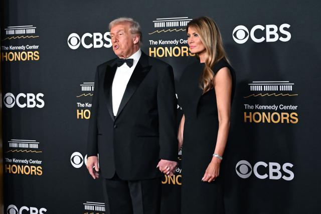 US President Donald Trump and First Lady Melania Trump arrive for the 48th Kennedy Center Honors gala at the Kennedy Center in Washington, DC, on December 7, 2025. (Photo by Alex WROBLEWSKI / AFP)