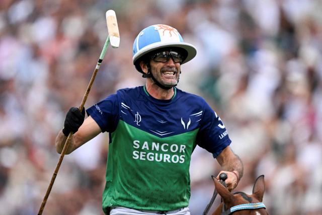 La Natividad La Dolfina Argentinian polo player Adolfo Cambiaso celebrates after winning 132nd Argentine Polo Open tournament final match at the Palermo polo field in Buenos Aires on December 7, 2025. (Photo by Luis ROBAYO / AFP)