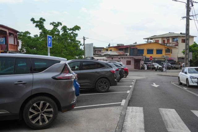 This photograph shows a street a year after the cyclone Chido in the village of Sada, on the French Indian Ocean territory of Mayotte, on December 5, 2025. One year after Cyclone Chido devastated the Indian Ocean archipelago, ‘nothing has been done,’ laments one resident. "Thousands of affected households remain without adequate and decent housing," warns the Housing Foundation. (Photo by Marine GACHET / AFP)
