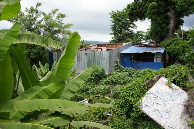 This photograph shows a restaurant a year after the cyclone Chido in the village of Sada, on the French Indian Ocean territory of Mayotte, on December 5, 2025. One year after Cyclone Chido devastated the Indian Ocean archipelago, ‘nothing has been done,’ laments one resident. "Thousands of affected households remain without adequate and decent housing," warns the Housing Foundation. (Photo by Marine GACHET / AFP)