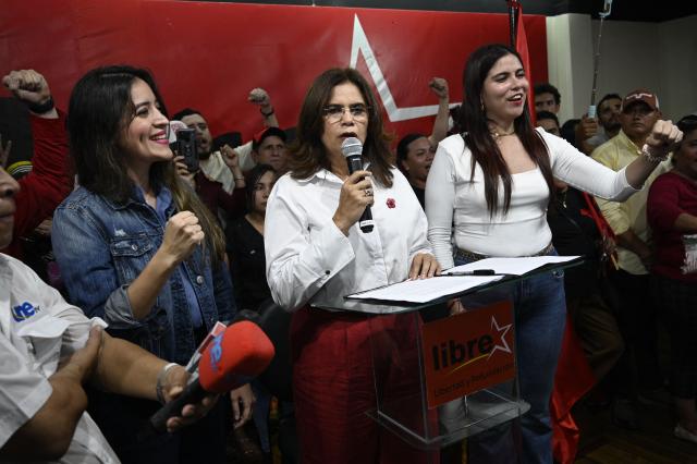 Honduran presidential candidate Rixi Moncada of the ruling Libertad y Refundacion (LIBRE) party speaks during a press conference at the Libre Party branch in Tegucigalpa on December 7, 2025. The release of the vote count from the presidential elections held a week ago in Honduras remained stalled this Sunday for the second consecutive day, according to an electoral authority and one of the candidates. (Photo by Orlando SIERRA / AFP)