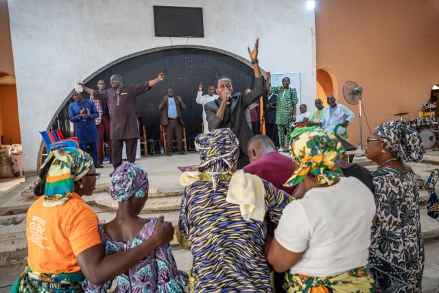 Worshippers pray at the Evangelical Church Winning All (ECWA) during a prayer called by the Christian Association of Nigeria (CAN) in Minna on December 7, 2025. Nigerian authorities have secured the release of 100 kidnapped schoolchildren taken by gunmen from a Catholic school last month, a UN source and local media said Sunday, though the fate of the 165 students and staff thought to remain in captivity remains unclear.
In late November 315 students and staff were kidnapped from St. Mary's co-educational boarding school in north-central Niger state, as the country buckled under a wave of mass abductions reminiscent of the infamous 2014 Boko Haram abduction of schoolgirls in Chibok. (Photo by Light Oriye Tamunotonye / AFP)