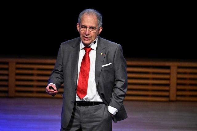 Nobel Prize winner in Physics, Michel H. Devoret speaks during the Nobel Prize Lecture in Physics in Aula Magna at Stockholm University on December 8, 2025. (Photo by Christine Olsson/TT / TT NEWS AGENCY / AFP) / Sweden OUT