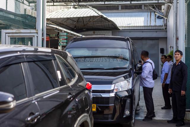 Vehicles carrying Dutch drug convicts Siegfried Mets, 74, and Ali Tokman, 65, leave Cipinang Prison in Jakarta on December 8, 2025, during their release for repatriation to the Netherlands on humanitarian grounds. Mets, who was sentenced to death in Indonesia 17 years ago for drug trafficking, was released from a Jakarta prison on December 8. He was due to fly home later on December 8, accompanied by fellow Dutch inmate Tokman who was serving a life sentence for a similar offence and also was granted a reprieve. (Photo by ADITYA AJI / AFP)