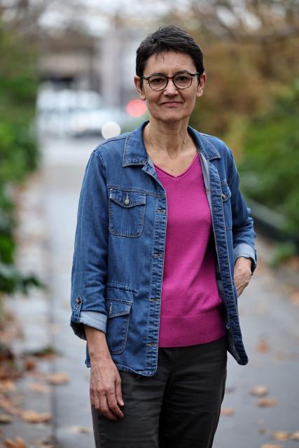 French far-left party Lutte Ouvriere (LO) spokesperson Nathalie Arthaud poses prior a press conference after the LO congress on the international and national situation, as well as its participation in the upcoming municipal and presidential elections, in Paris on December 8, 2025. Nathalie Arthaud announced on December 8, 2025 that she would be running for president in 2027, her fourth bid since 2012. (Photo by Anne-Christine POUJOULAT / AFP)