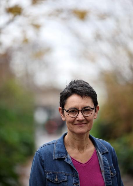 French far-left party Lutte Ouvriere (LO) spokesperson Nathalie Arthaud poses prior a press conference after the LO congress on the international and national situation, as well as its participation in the upcoming municipal and presidential elections, in Paris on December 8, 2025. Nathalie Arthaud announced on December 8, 2025 that she would be running for president in 2027, her fourth bid since 2012. (Photo by Anne-Christine POUJOULAT / AFP)