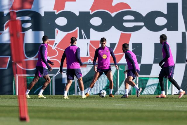 Barcelona players attend a training session on the eve of the UEFA Champions League league phase day 6 football match between FC Barcelona and Eintracht Frankfurt at the Joan Gamper training ground in Sant Joan Despi, near Barcelona, on December 8, 2025. (Photo by Lluis GENE / AFP)