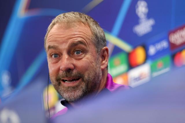 Barcelona's German coach Hans-Dieter Flick speaks during a press conference on the eve of the UEFA Champions League league phase day 6 football match between FC Barcelona and Eintracht Frankfurt at the Joan Gamper training ground in Sant Joan Despi, near Barcelona, on December 8, 2025. (Photo by Lluis GENE / AFP)