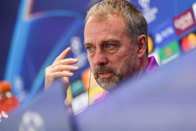 Barcelona's German coach Hans-Dieter Flick gestures during a press conference on the eve of the UEFA Champions League league phase day 6 football match between FC Barcelona and Eintracht Frankfurt at the Joan Gamper training ground in Sant Joan Despi, near Barcelona, on December 8, 2025. (Photo by Lluis GENE / AFP)