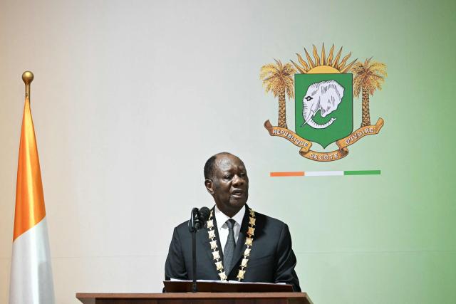 TOPSHOT - Ivory Coast President Alassane Ouattara pronounces his speech after having been sworn in at the Presidential Palace in Abidjan on December 8, 2025. (Photo by SIA KAMBOU / POOL / AFP)