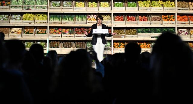 France's Agriculture Minister Annie Genevard gives a speech at the closing of the 'Grand Réveil Alimentaire' (Great Food Awakening) conference, in Rungis, on the outskirts of Paris, on December 8, 2025. (Photo by JULIEN DE ROSA / AFP)