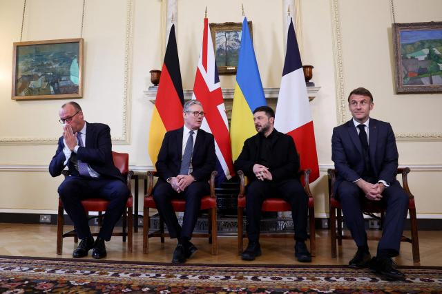 (L to R) Germany's Chancellor Friedrich Merz, Britain's Prime Minister Keir Starmer, Ukraine's President Volodymyr Zelensky and French President Emmanuel Macron take part in meetings at Number 10 Downing Street in central London on December 8, 2025. (Photo by Toby Melville / POOL / AFP)