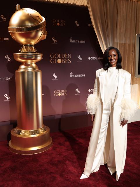 US actress Skye P. Marshall poses next to an oversized Golden Globe during the nominations announcement event for the 83rd Golden Globe Awards in Beverly Hills, California, on December 8, 2025. The 83rd Golden Globe Awards will take place on January 11, 2026. (Photo by Patrick T. Fallon / AFP)
