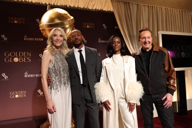 (L/R) Golden Globes President Helen Hoehne, US actor Marlon Wayans, US actress Skye P. Marshall and US producer Barry Adelman pose for a photo during the nominations announcement event for the 83rd Golden Globe Awards in Beverly Hills, California, on December 8, 2025. The 83rd Golden Globe Awards will take place on January 11, 2026. (Photo by Patrick T. Fallon / AFP)