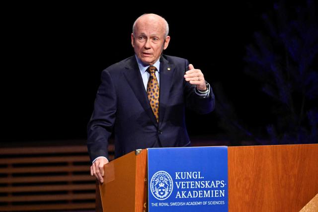 Laureate of The Sveriges Riksbank Prize in Economic Sciences 2025 Canadian economist Peter Howitt gives his lecture in Economic Science at the Aula Magna at Stockholm University in Stockholm, Sweden, on December 8, 2025. (Photo by Christine OLSSON / TT News Agency / AFP) / Sweden OUT