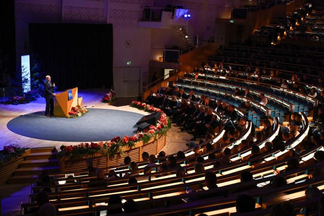 Laureate of The Sveriges Riksbank Prize in Economic Sciences 2025 Canadian economist Peter Howitt gives his lecture in Economic Science at the Aula Magna at Stockholm University in Stockholm, Sweden, on December 8, 2025. (Photo by Christine OLSSON / TT News Agency / AFP) / Sweden OUT