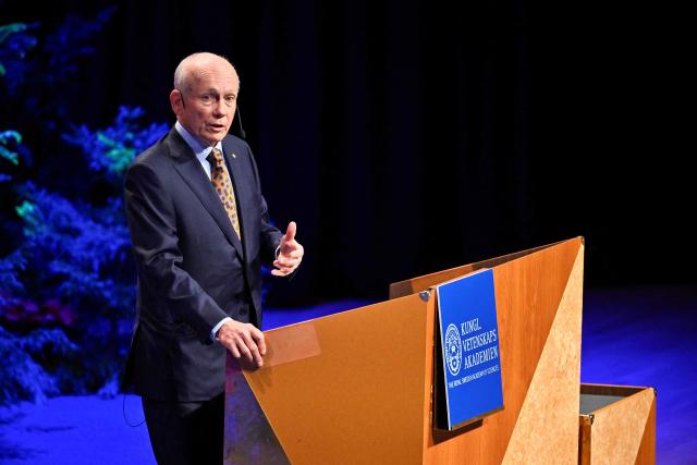 Laureate of The Sveriges Riksbank Prize in Economic Sciences 2025 Canadian economist Peter Howitt gives his lecture in Economic Science at the Aula Magna at Stockholm University in Stockholm, Sweden, on December 8, 2025. (Photo by Christine OLSSON / TT News Agency / AFP) / Sweden OUT